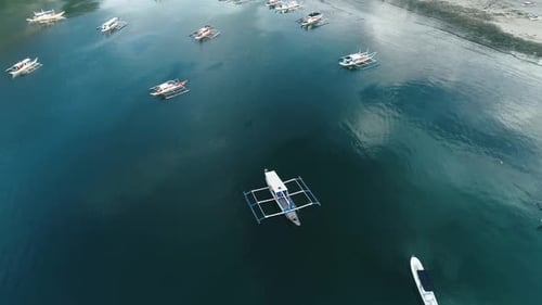 Aerial Drone View of Boats Anchored in the Bay with Clear and Turquoise Water Boat and Yacht in the