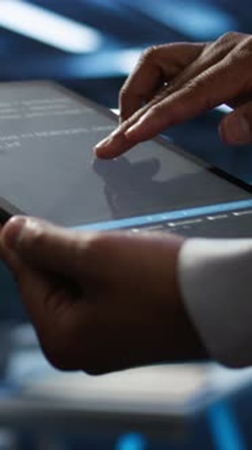 Vertical Video Programmer Using Device in Data Center Close Up