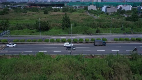 Freeway, highway or motorway with traffic on sunny clear day with all types of motor vehicles. Camer