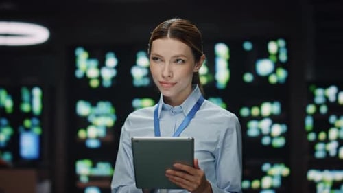 Data Center Woman Working Tablet Computer Looking Distance at Office Closeup