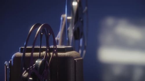 CloseUp Of Retro Projector Showing 8Mm Film In A Dark Home Theater