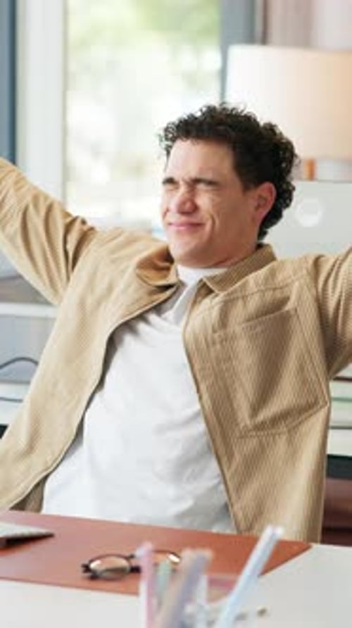 Stretching, rest and man in office with keyboard, satisfaction or completed task in project