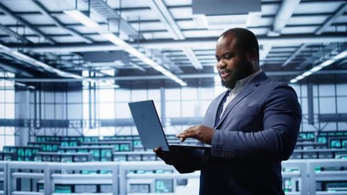 IT Professional in Server Room Looking for Network Issues