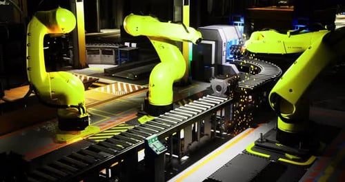Bras robotiques avancés travaillant sur une chaîne de montage dans une usine moderne