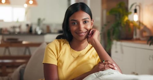 Woman Smiling Gently Indoors During Daytime