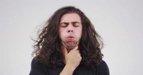 Young Adult with Sore Throat and Discomfort