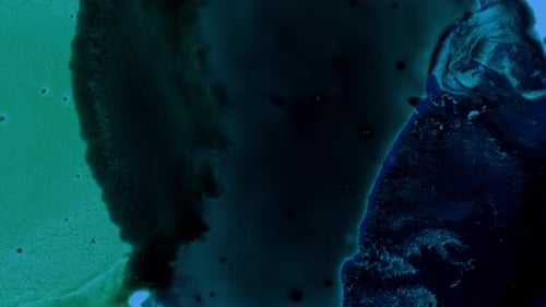 Dark ocean, visual ink dye visual, sea inspired, green color gush spreading