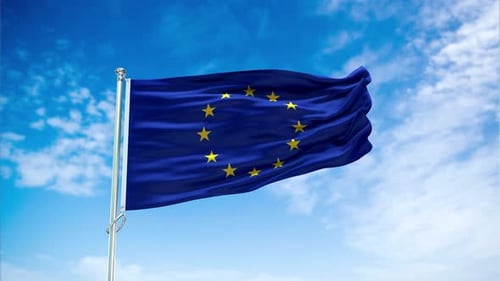 European Union Flag Waving in Realistic Blue Sky