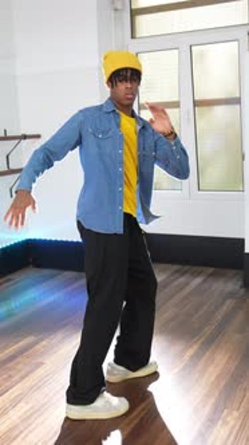 Young Man Dancing Afro Hip Hop in Dance Studio