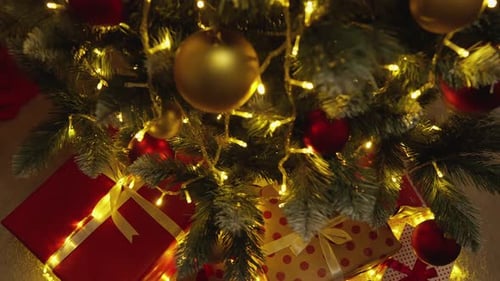 Festive Christmas Tree with Sparkling Lights and Gifts