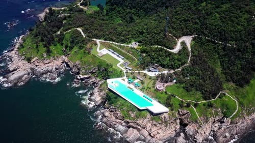 Aerial Top view of a transparent blue sea with beautiful waves at sunny day in summer. air of ocean