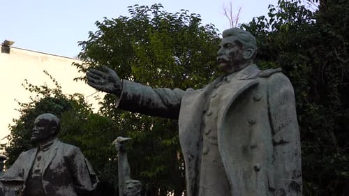 Stone Sculptures of Figures Outdoors