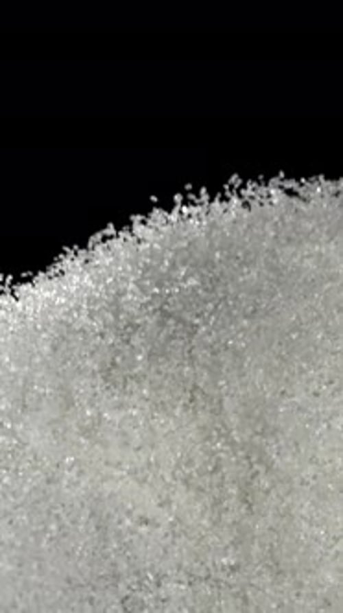 Sugar Flies Up and Down Filmed on a Highspeed Camera at 1000 Fps
