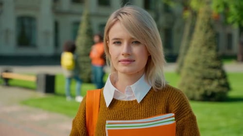 Female Student Smiling on College Campus