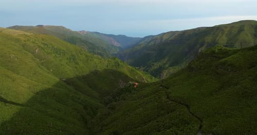 Scenic Landscape Wild Nature Tropical Island with Rocky Mountains Overgrown Dense Green Trees Modern