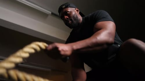 Man Working Out With Battle Ropes - Slow motion