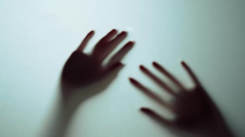 Macro Video of Hands Shadow Moving in Air in Studio. Horror Element