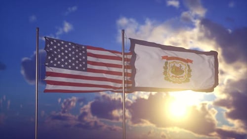 United States and West Virginia Flags Waving at Sunset