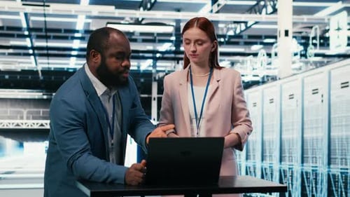 Server Hub Engineering Team Using Laptop to Monitor Power Consumption