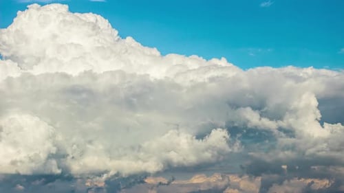 Time Lapse of Clouds Moving Across Blue Sky