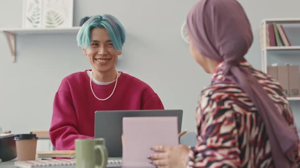 Young Creative Programmers Chatting at Workplace, Technology Stock ...