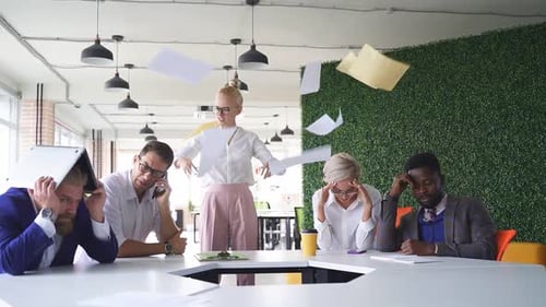 Angry Female Director Dissatisfied with the Work She Shouts at Employees Throws Paper Up
