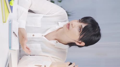 Woman Talking Angrily on Smartphone