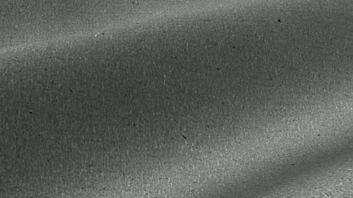 Clean Vintage Grey Paper Texture in High Resolution, Looped Background, Rotation, Waves