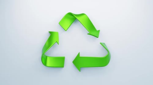 A 3D recycle symbol in bright green stands prominently against a clean
