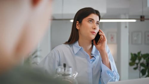 Office Employee Talking Cellphone in Office Closeup Beautiful Assistant Making