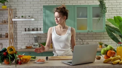Young Woman at the Table in the Kitchen Preparing Spring Rolls for Healthy Lunch Woman Foodie