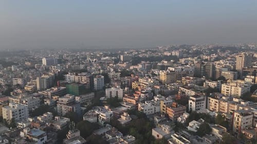 Wide city view of Hyderabad featuring water bodies and residential zones.