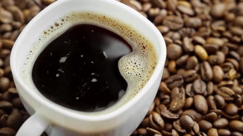 Fresh Black Coffee and Roasted Coffee Beans