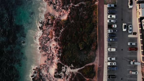 Aerial View of Parking Lot Near the Ocean
