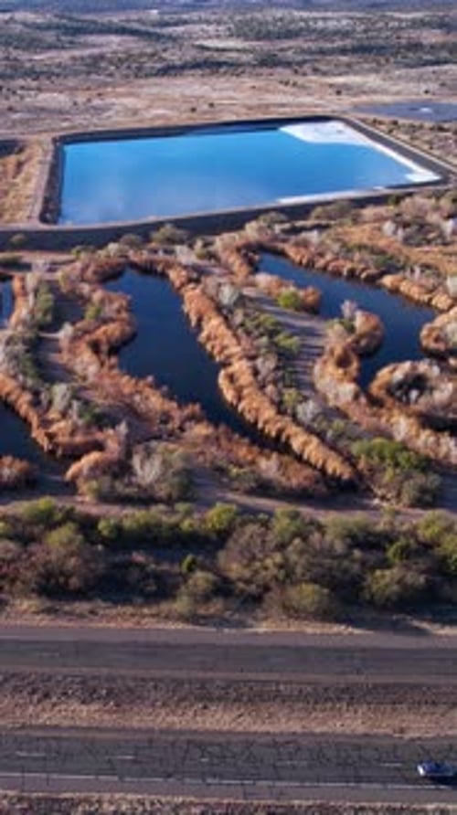 Vertical Drone Shot of Wastewater Treatment Facility, Sedona Wetlands Preserve and Traffic on Arizon