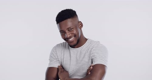 Young Adult Smiling and Posing in Studio
