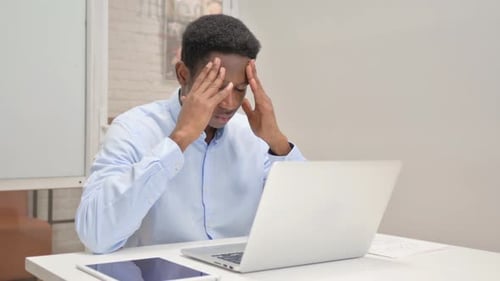 Man Types, Frustrated, Hands on Head