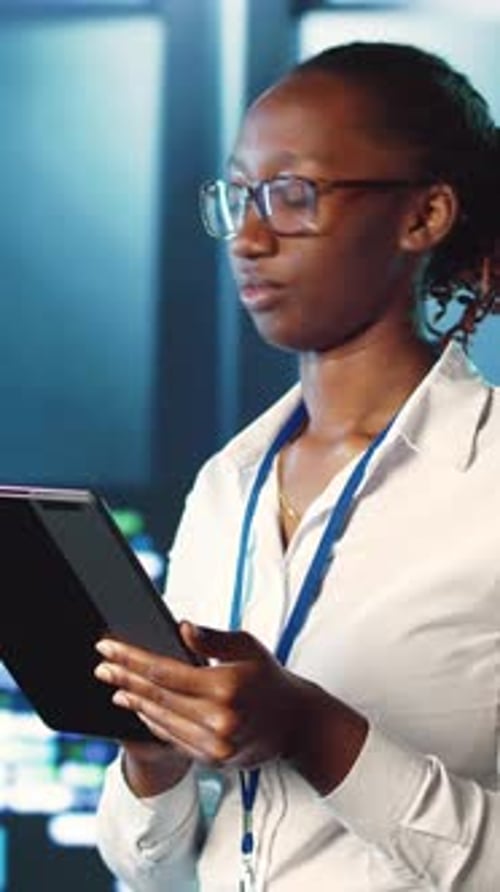 Vertical Video Professional Strolls Through Data Center