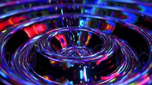 Iridescent Concentric Ripples Expanding Dynamically Across Dark Background Generating Mesmerizing