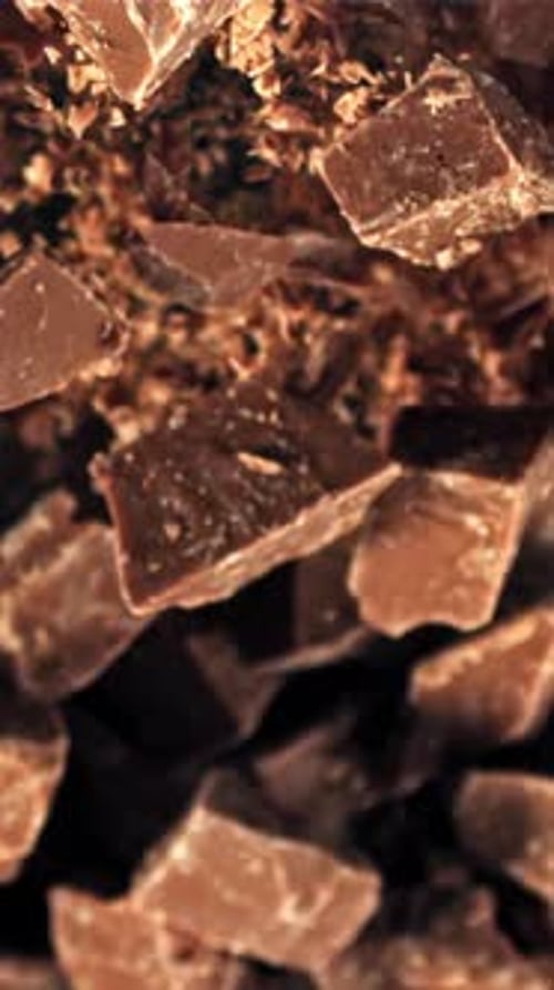 Chunks of Chocolate Fly Up and Fall Down Filmed on a Highspeed Camera at 1000 Fps