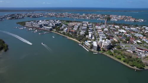Motorboats Cruising In The Blue Sea With Calm Waters Along The Paradise Point In Queensland, Austral