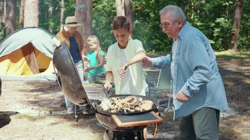 Family Barbeque and Camping in Sunny Forest