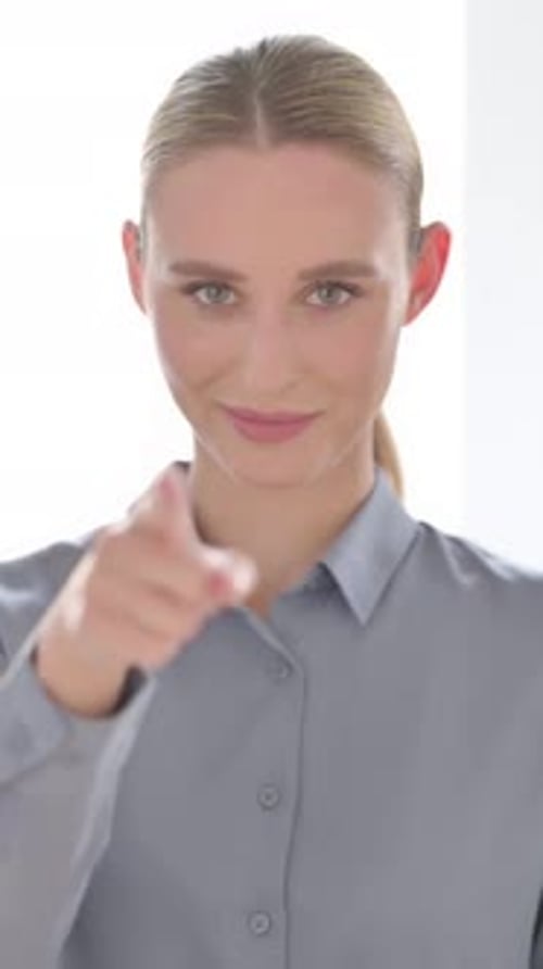 Portrait of Woman Pointing at the Camera and Inviting, Vertical Video