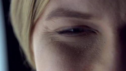 Blue eyes. Close-up of woman's eye with visible iris and pupil. Seeing and vision. Good eyesight. Op