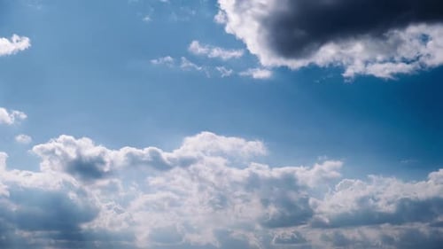 Timelapse of Cumulus Clouds Moves In The Blue Sky