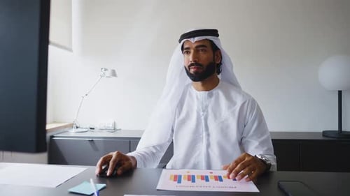 businessman working in a modern office in the united arab emirates.