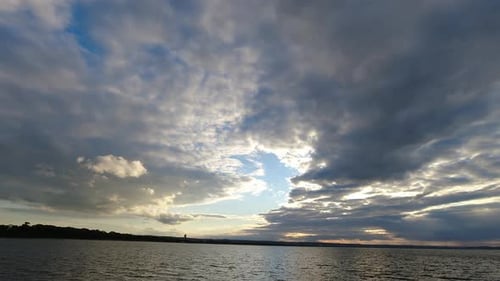 Dramatic Clouds Reflecting in the Ocean at Sunset