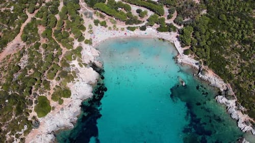 People swimming in the sea and sunbathing on the beach on the Turkish coast
