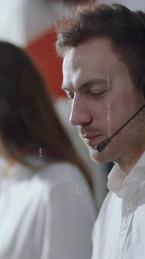 Dedicated and Focused Call Center Agent Operating Effectively in a Modern Workspace Environment