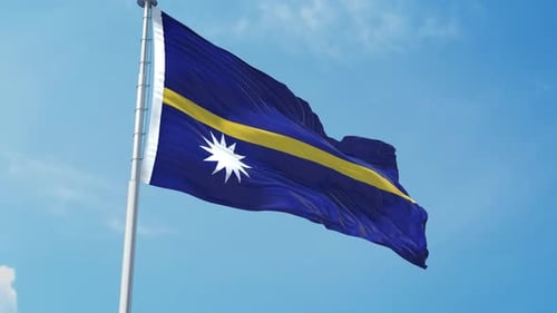 Nauru Flag Waving Seamlessly Against Blue Sky